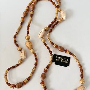 Medici Two Sisters Cowrie Shell and Wooden Bead Necklace. Vintage